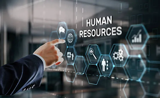 A hand reaching toward a hexagonal interface of human-resources icons —
                   records, search, people and reporting.